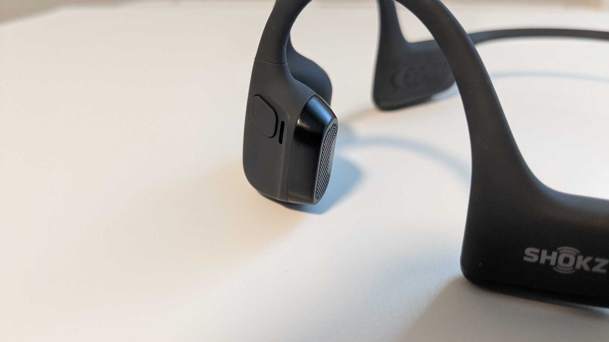 The 'Play' button on the Shokz OpenRun Pro 2.