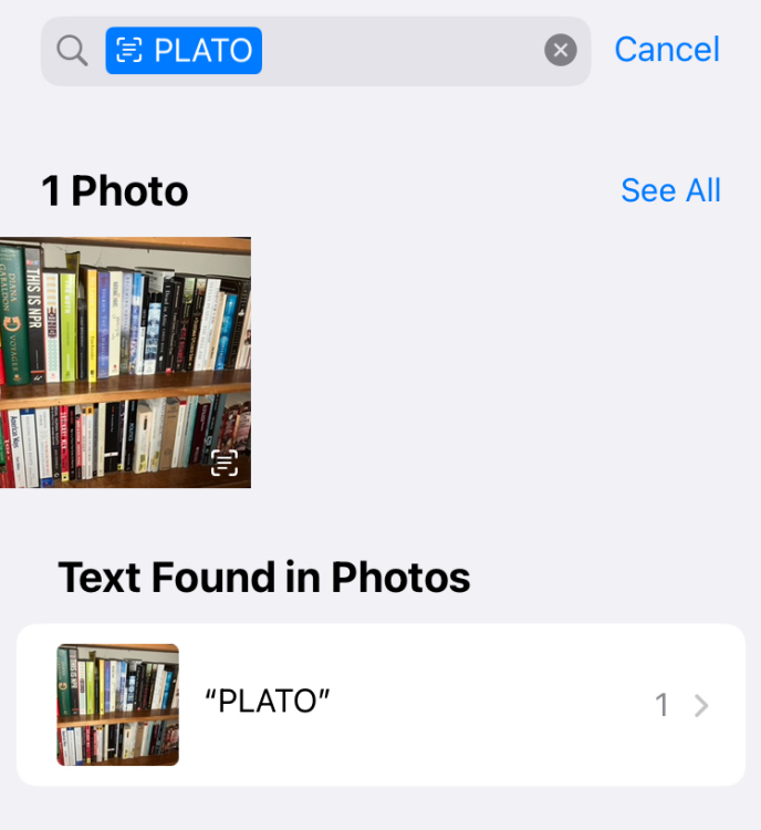 Search result for 'Plato' in Photos App from a bookshelf image.